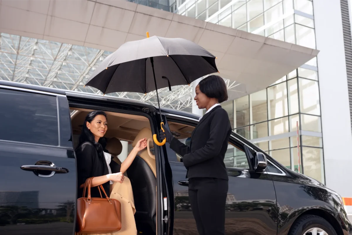 Business woman getting taxi cab
